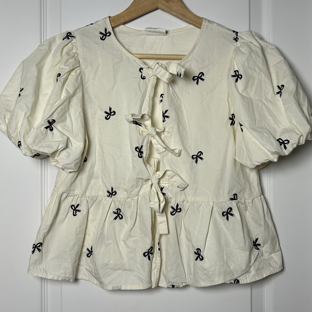 New'm Cream Embroidered Bow Print Coquette Puff Sleeve Tie Front‎ Peplum Blouse